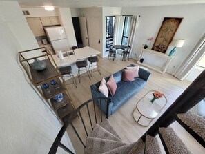 TV, fireplace - Chic, well-appointed 1-bedroom poolside condo with loft (Oklahoma City)