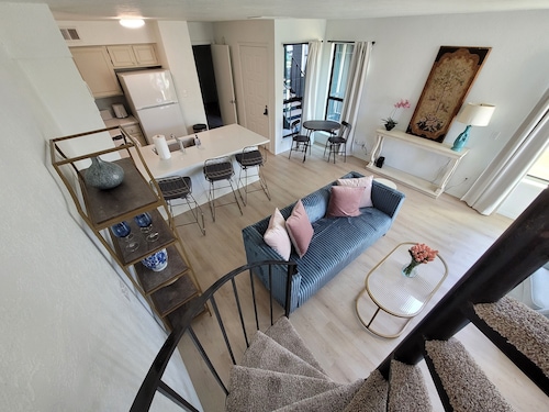 Chic, well-appointed 1-bedroom poolside condo with loft