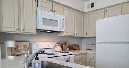 Chic, well-appointed 1-bedroom poolside condo with loft