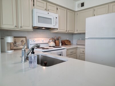 Chic, well-appointed 1-bedroom poolside condo with loft