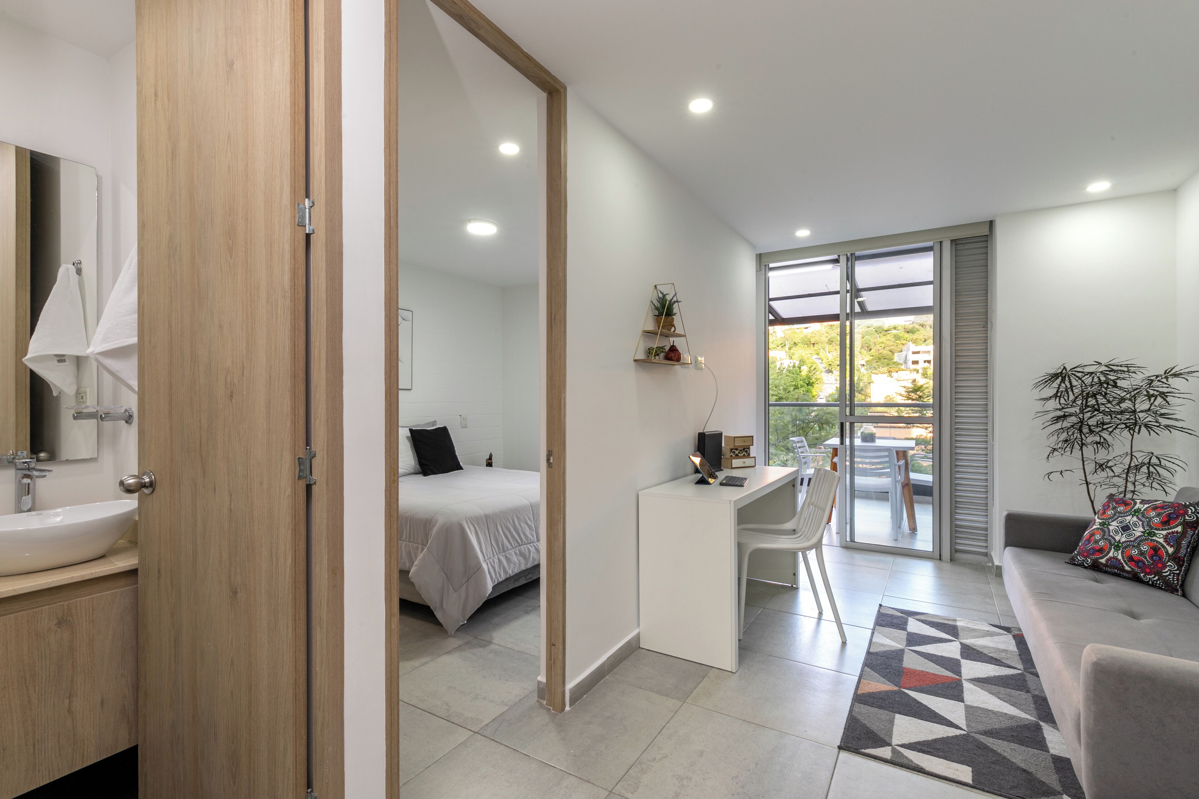 Standard Apartment, 1 Bedroom, Balcony, Garden View | Living area | 50-inch Smart TV with cable channels