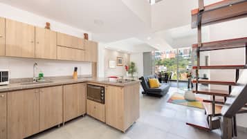 Superior Duplex, Balcony, City View | Private kitchen | Full-size fridge, microwave, stovetop, cookware/dishes/utensils