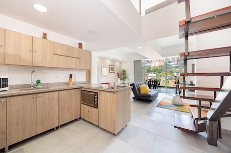 Superior Duplex, Balcony, City View | Private kitchen | Full-size fridge, microwave, stovetop, cookware/dishes/utensils