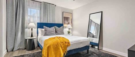 1 bedroom, desk, iron/ironing board, travel crib