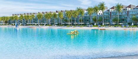Et resort med en stor swimmingpool, palmer og en strand.
