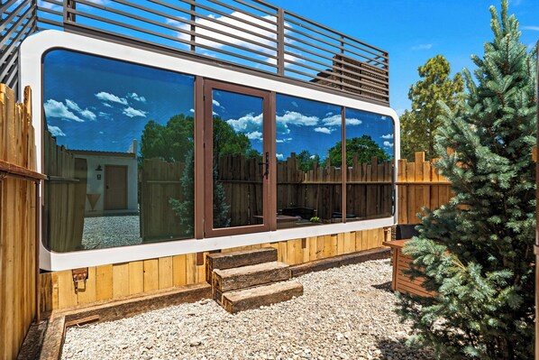 Exterior - LUXX Space Cabin Tiny House with rooftop deck, private fenced patio. (Ranchos De Taos)