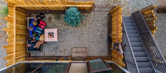 LUXX Space Cabin Tiny House with rooftop deck, private fenced patio.