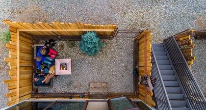 LUXX Space Cabin Tiny House with rooftop deck, private fenced patio.