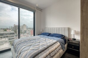 2 habitaciones, tabla de planchar con plancha, cuna de viaje y wifi 