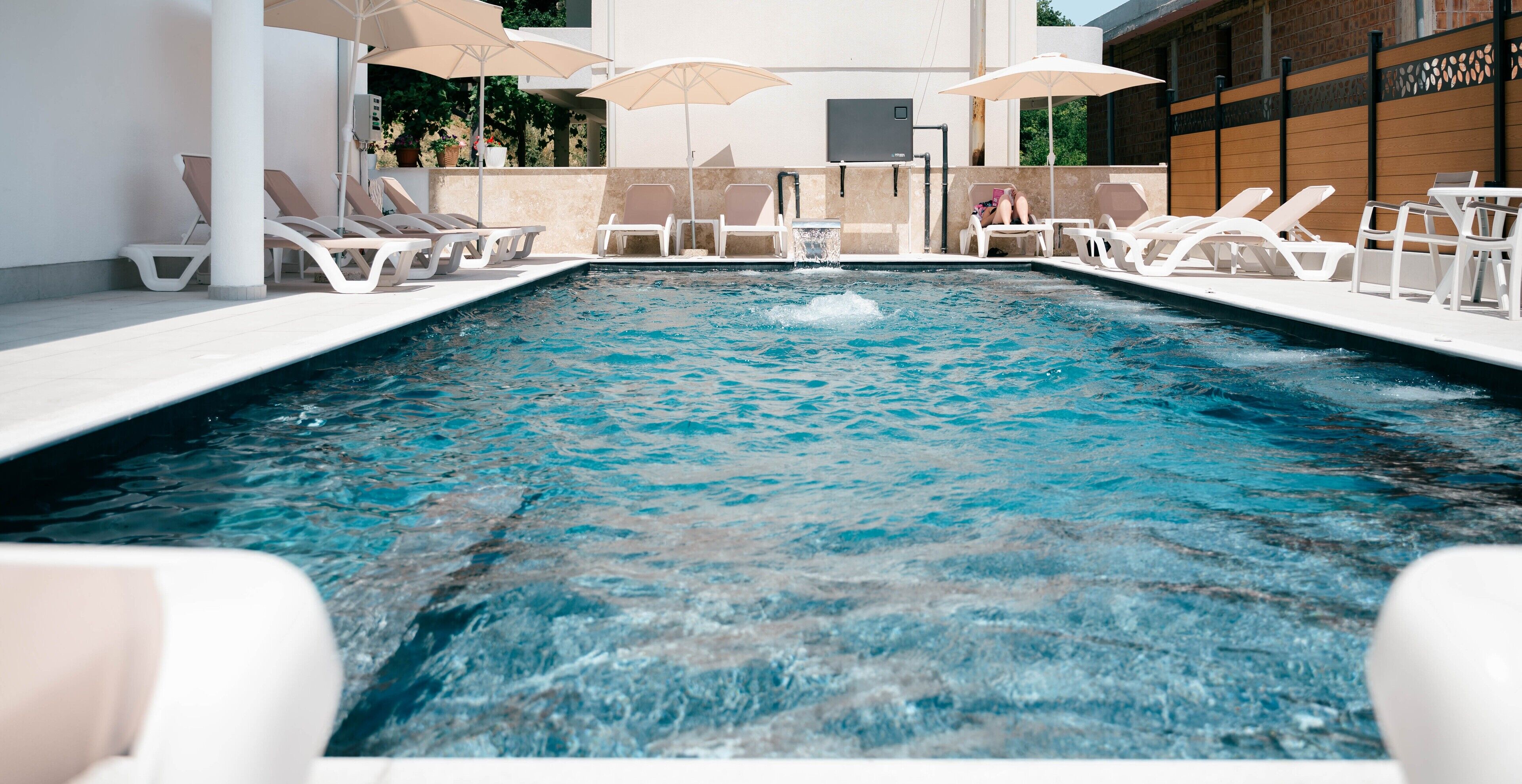 Outdoor pool, open 8:00 AM to 8:00 PM, free cabanas, pool umbrellas