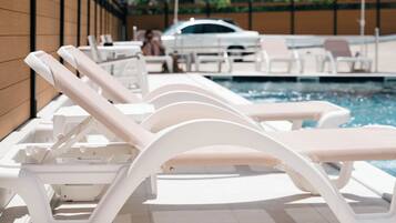 12 outdoor pools, open 8:00 AM to 8:00 PM, free cabanas, pool umbrellas