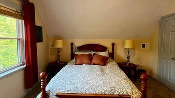 Tabla de planchar con plancha, wifi gratis y ropa de cama