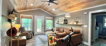 3-br cabin with Private Dock on the River, covered porch and large back deck