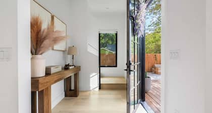 Stylish Home With Firepit & Balcony Steps From Austins Best Near Rainey St, Lady Bird Lake & Downtown The Ashlee by Avantstay