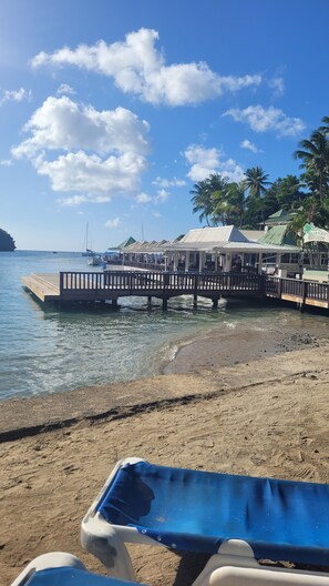 On the beach, sun-loungers, beach towels