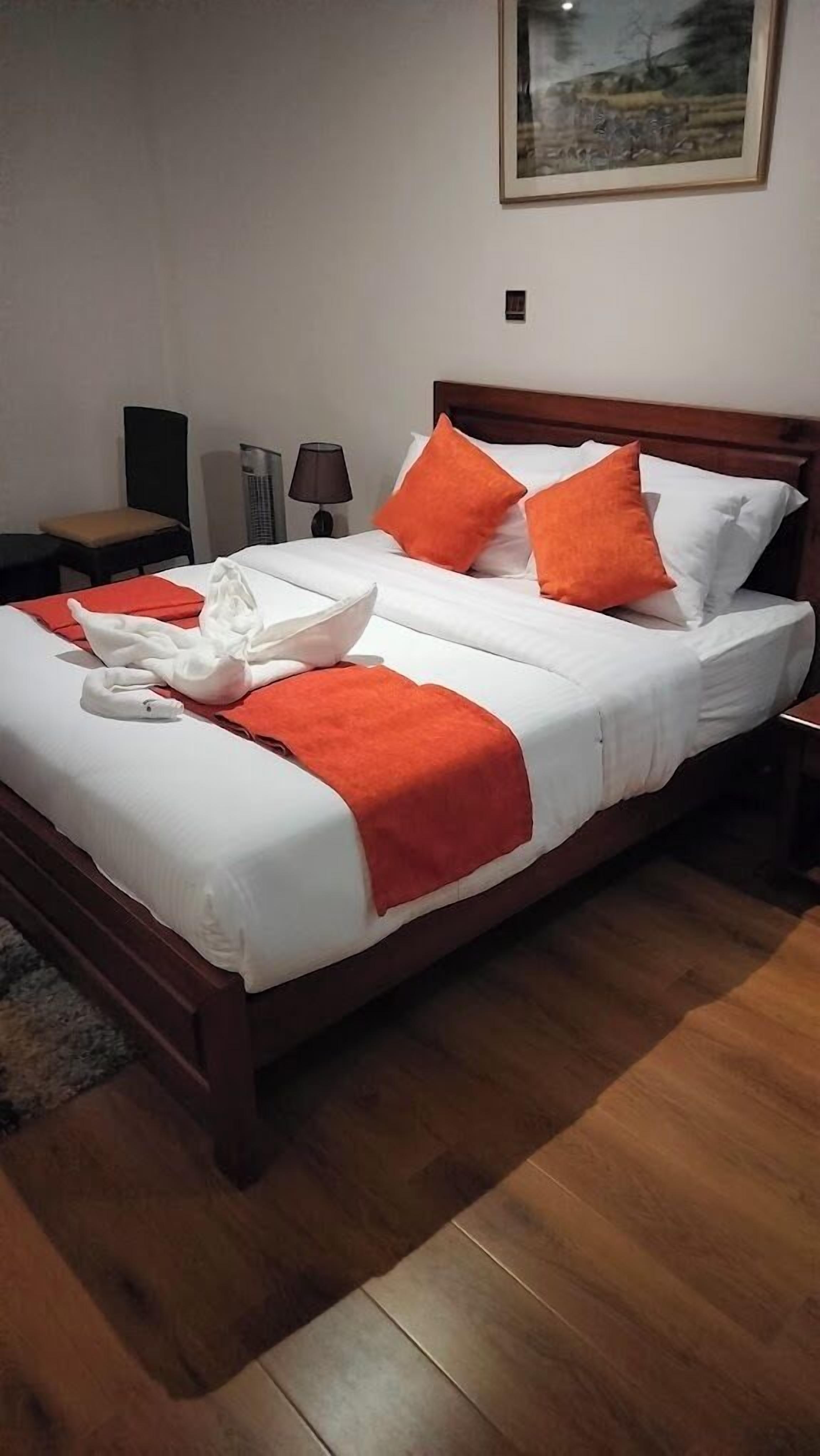 スタンダード シングルルーム ガーデンビュー | WiFi (無料)、ベッドシーツ