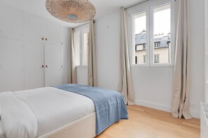 2 habitaciones, tabla de planchar con plancha, wifi y ropa de cama 