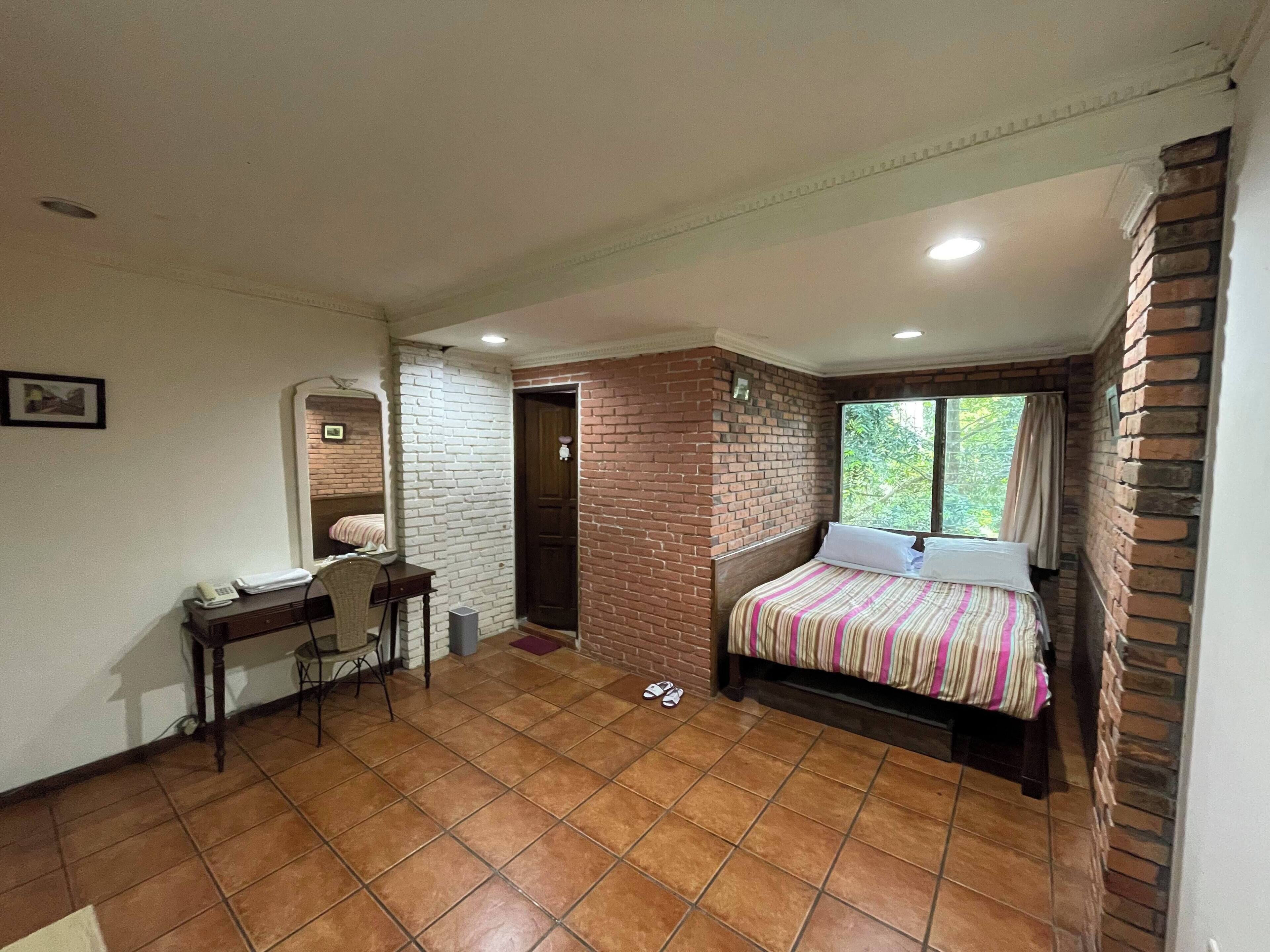 Habitación Deluxe doble, vistas al jardín | Escritorio, espacio para trabajar con un portátil, wifi gratis