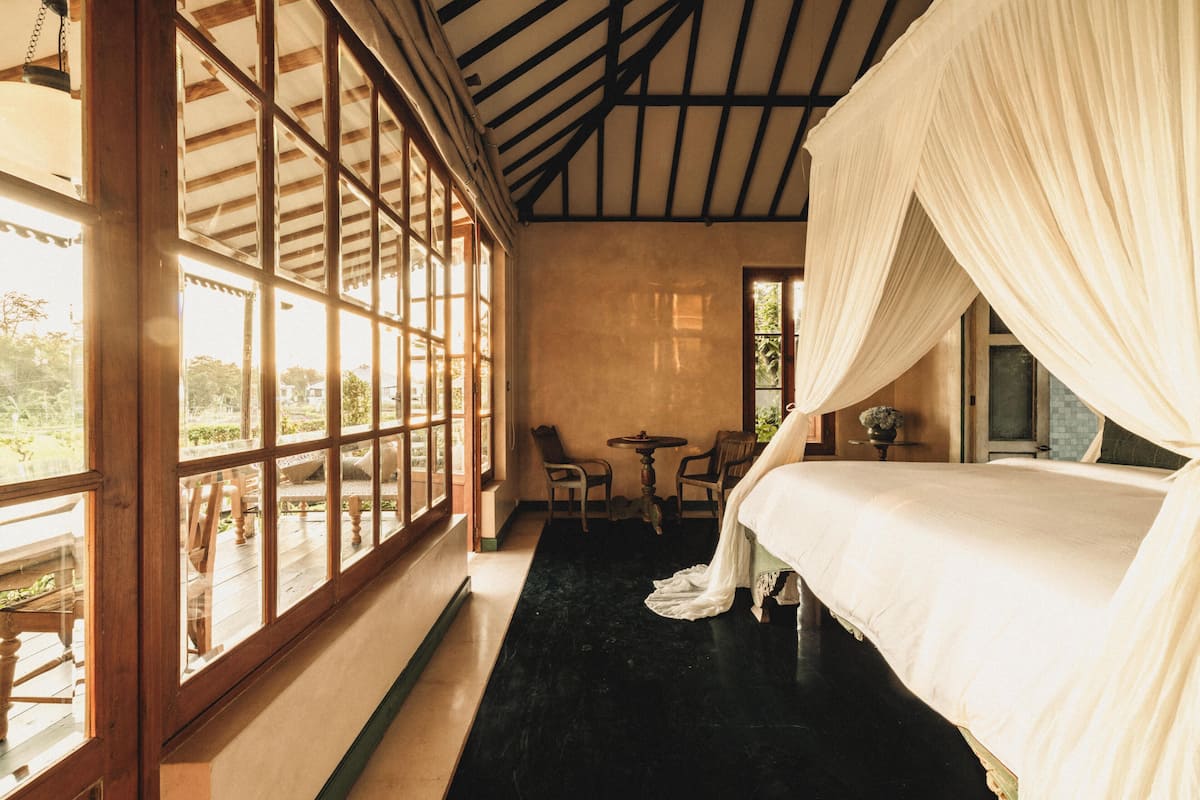 Suite, Pool View | Minibar, in-room safe, individually furnished, desk