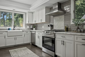 Coffee/tea maker, fridge, microwave, oven