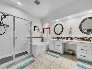 Shower, hair dryer, towels, soap