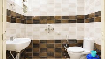 Shower, rainfall showerhead, slippers, towels