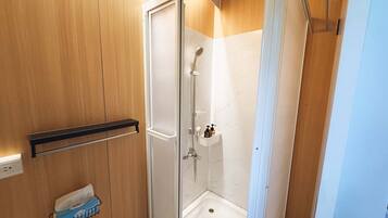 Shower, hair dryer, towels, shampoo