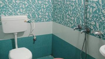 Shower, rainfall showerhead, slippers, towels