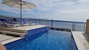 Apartemen Comfort, 2 kamar tidur | Kolam renang | Kolam renang outdoor dan sebuah kolam renang air hangat