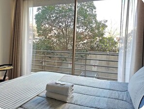 1 dormitorio, tabla de planchar con plancha, Internet y ropa de cama