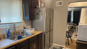 Private kitchen - Delightful 2-bedroom house with AC in Berkeley Iconixx Getaway STL (Berkeley)