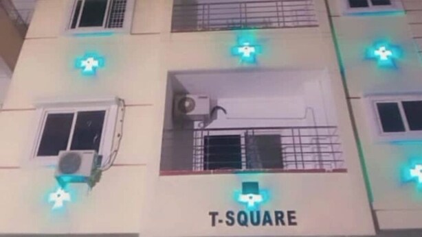 A building with multiple floors, each with a balcony and a window. The building is labeled "T-SQUARE". - Borcelle Homes:An Essence of Luxury ✨ (Hyderabad)
