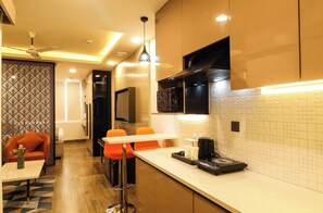 32-inch flat-screen TV with cable channels - AR Suites Sohna Road (Gurugram)