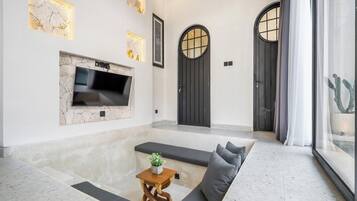 Villa Deluxe, 2 habitaciones, vista a la alberca, junto a la alberca | Área de sala de estar