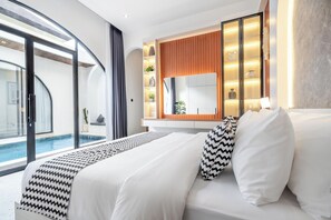 Villa Deluxe, 2 habitaciones, vista a la alberca, junto a la alberca | Tabla de planchar con plancha y wifi gratis 