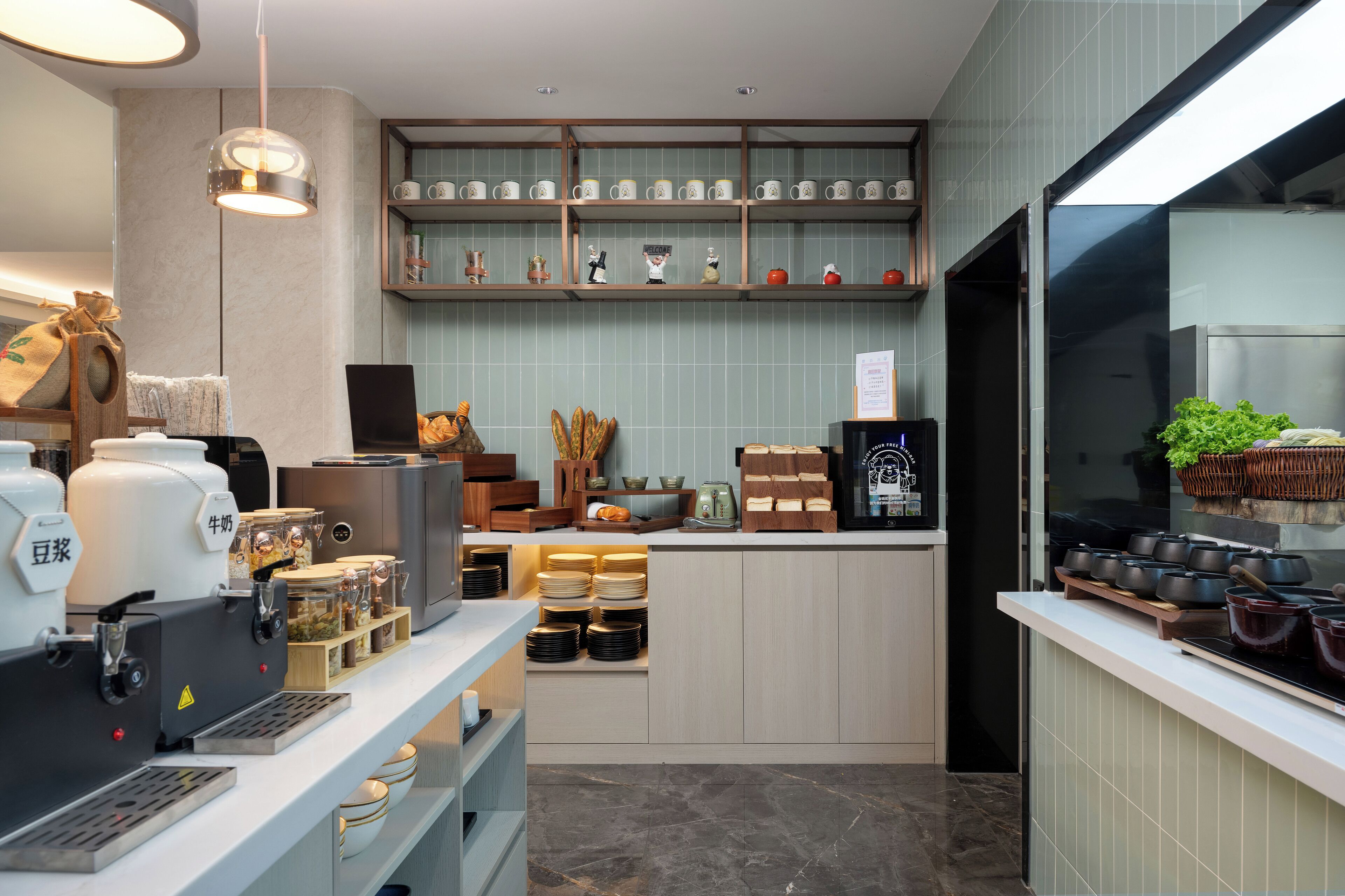 A modern kitchen with a coffee station, shelves with kitchenware, and a counter with cooking utensils.