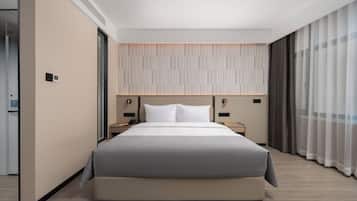 Habitación individual | Edredón, espacio para trabajar con laptop, wifi gratis y ropa de cama