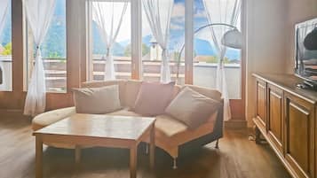 Suite Studio Deluxe, vue lac | Coin séjour