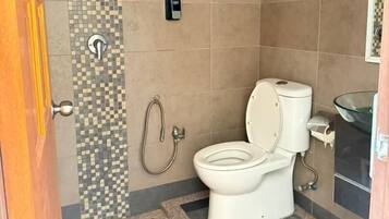 Shower, free toiletries, towels, soap