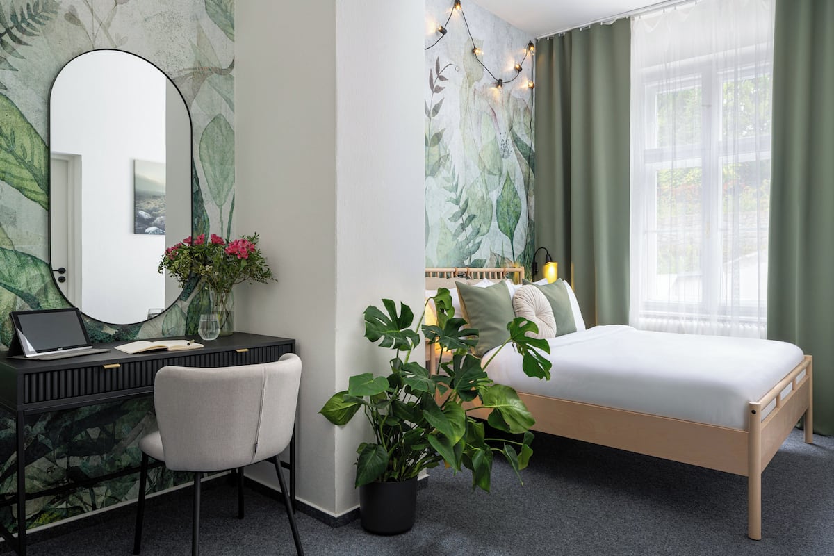 Elite tweepersoonskamer | Een gratis minibar, gratis babybedden, gratis wifi