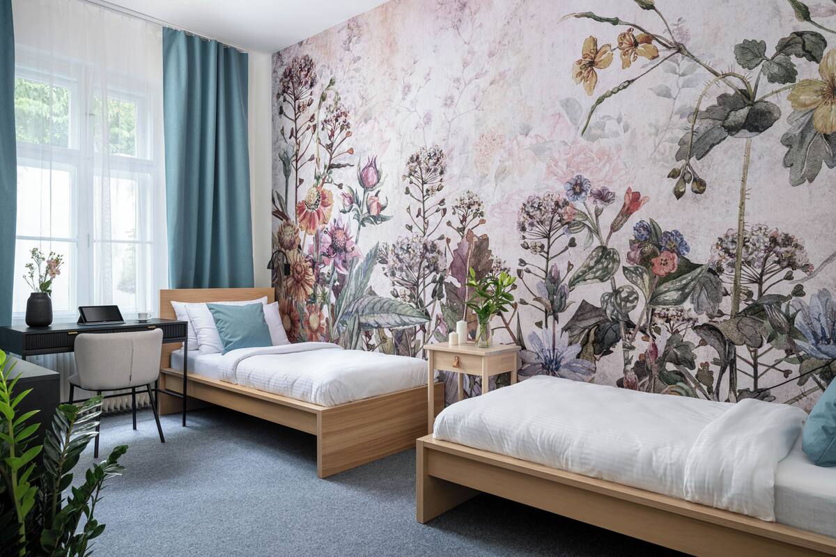 Signature tweepersoonskamer | Een gratis minibar, gratis babybedden, gratis wifi