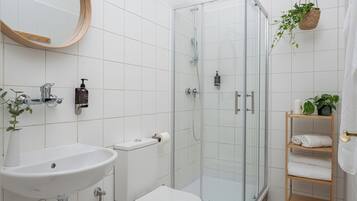 Shower, free toiletries, hair dryer, towels