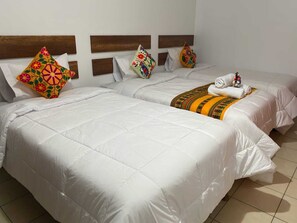 Standard Triple Room | Desk, laptop workspace, free WiFi