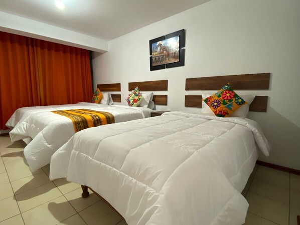 Kamar Triple Standar | Meja kerja, ruang kerja ramah laptop, dan Wi-Fi gratis