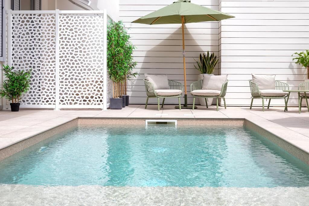 Outdoor pool, pool umbrellas, pool loungers