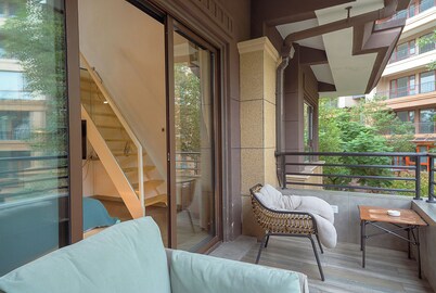 Heinemann Hotel loft suite with two king beds B306— with a jacuzzi and a local