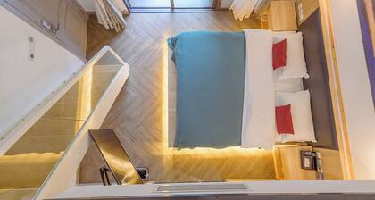 Suite loft de l'hĂŽtel Heinemann avec deux lits king size B306 â avec un jacuzzi et un local