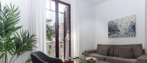 Apartamento Deluxe, 2 habitaciones | Zona de estar