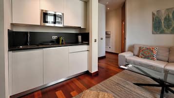 Deluxe Apartment, 2 Bedrooms | Private kitchen | Fridge, stovetop, cookware/dishes/utensils