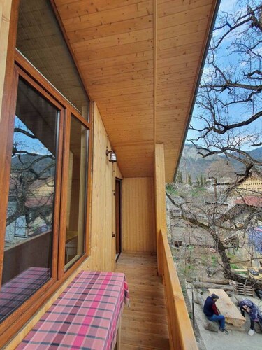 Eco cottage with retro architecture and natural wood interior in Borjomi